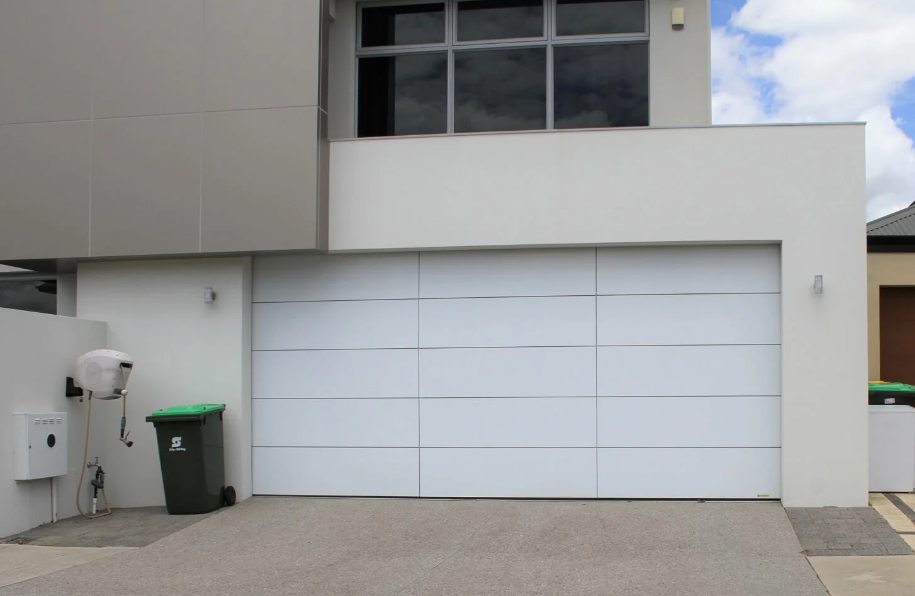 How Garage Door Panel Repair Restores Your Home’s Value