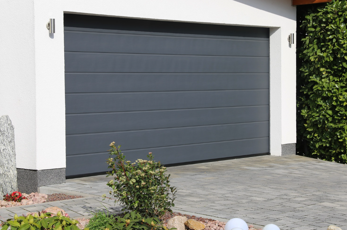 Top 5 Causes of Damage Requiring Garage Door Section Replacement
