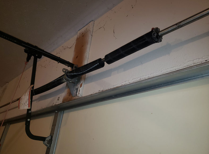 Broken Garage Door Spring Replacement