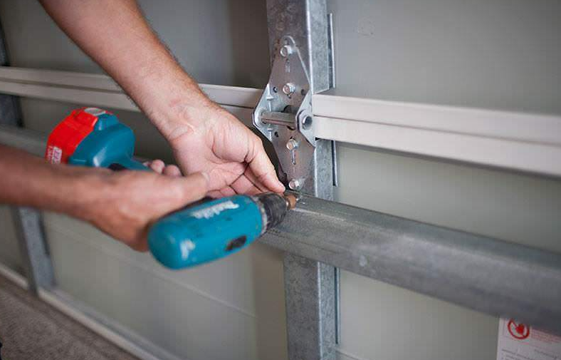 noisy garage door fix.